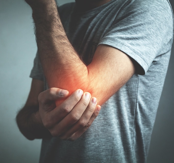 man with elbow pain