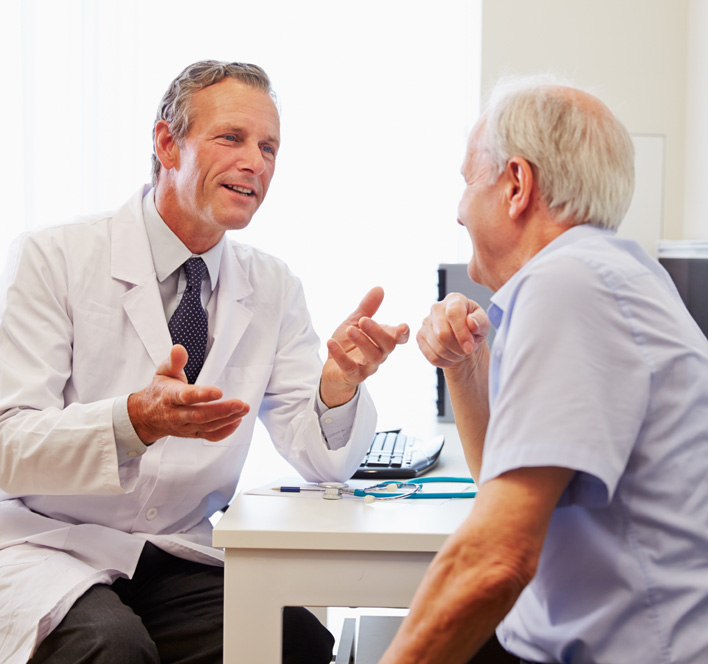 Senior Patient Having Consultation With Doctor